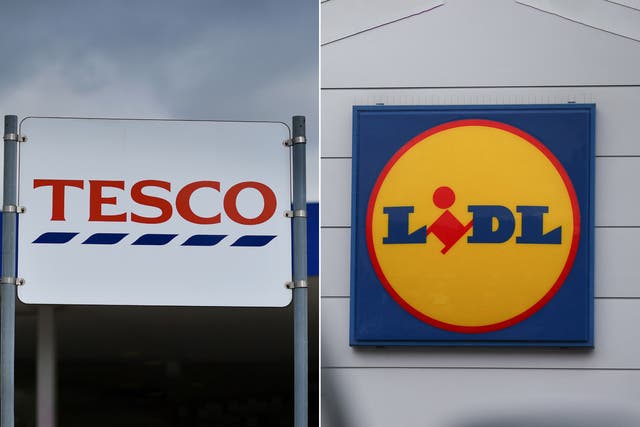 <p>A Tesco and Lidl sign  </p>