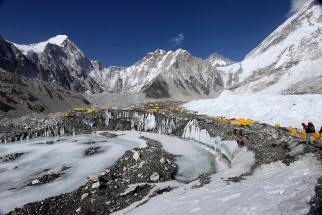 <p>File photo: Tents are set up for climbers on the Khumbu Glacier, with Mount Khumbutse, center, and Khumbu Icefall, right</p>