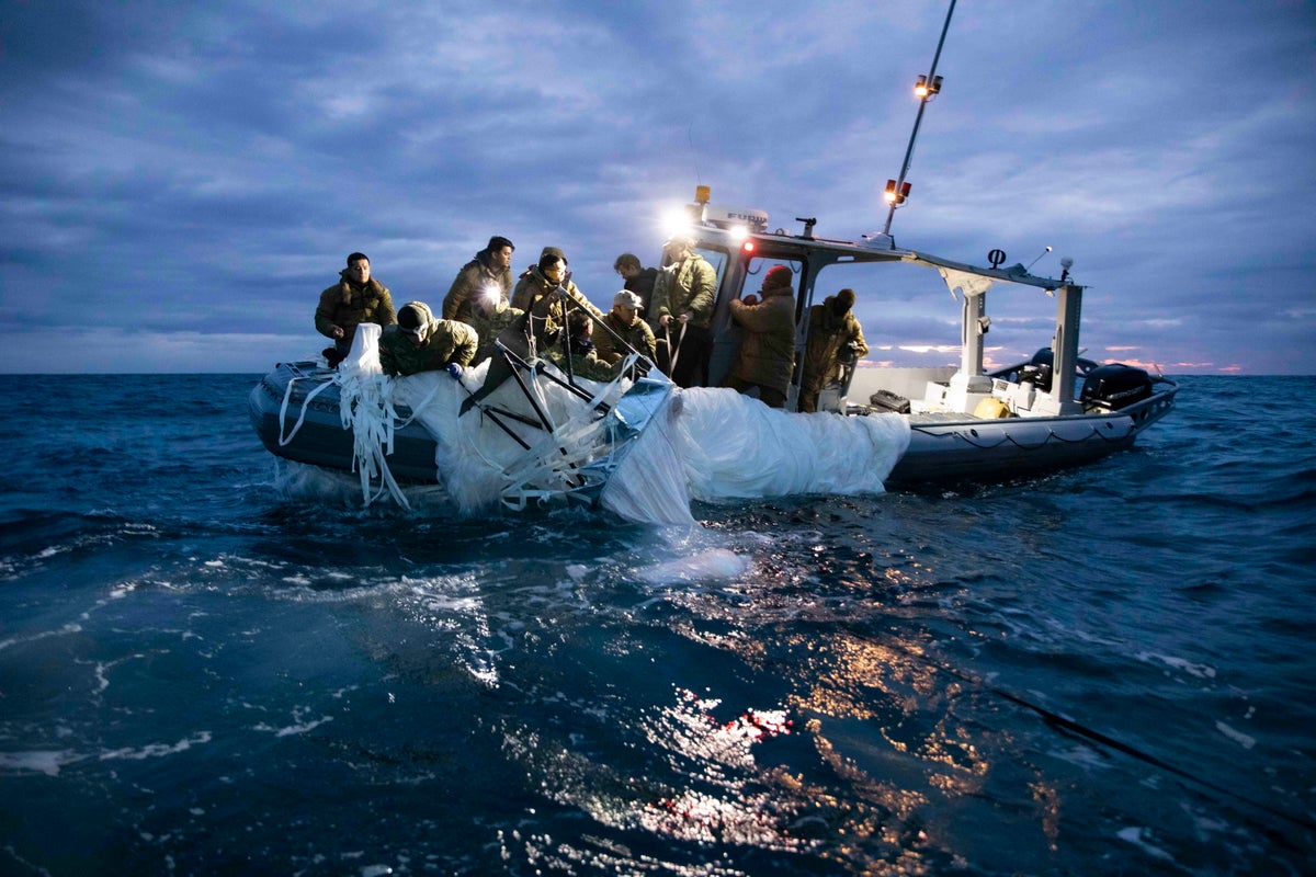 Chinese spy balloon – live: TikTok targeted by GOP in aftermath as Navy images reveal shot-down debris