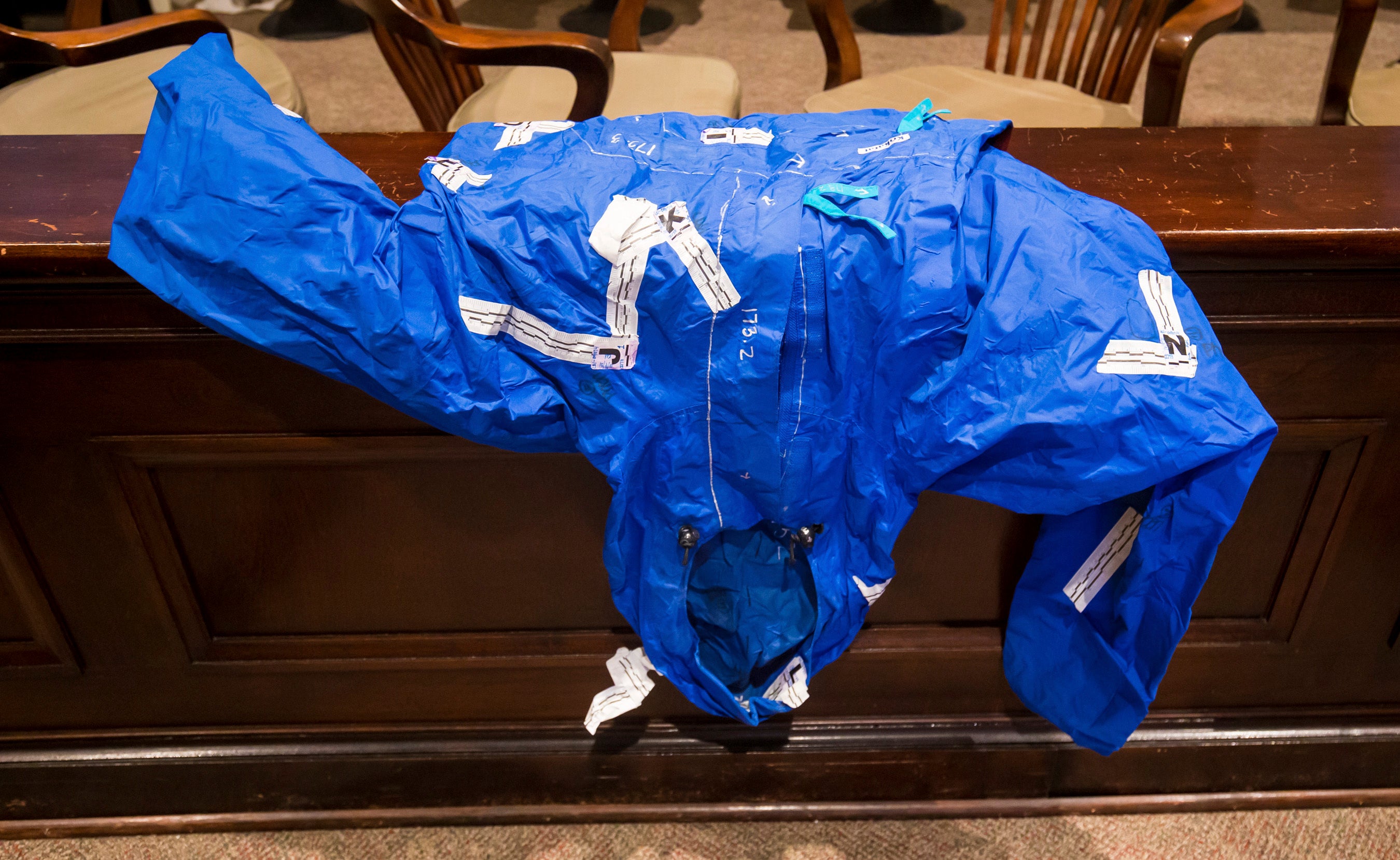 The blue rainjacket which was covered in gunshot residue