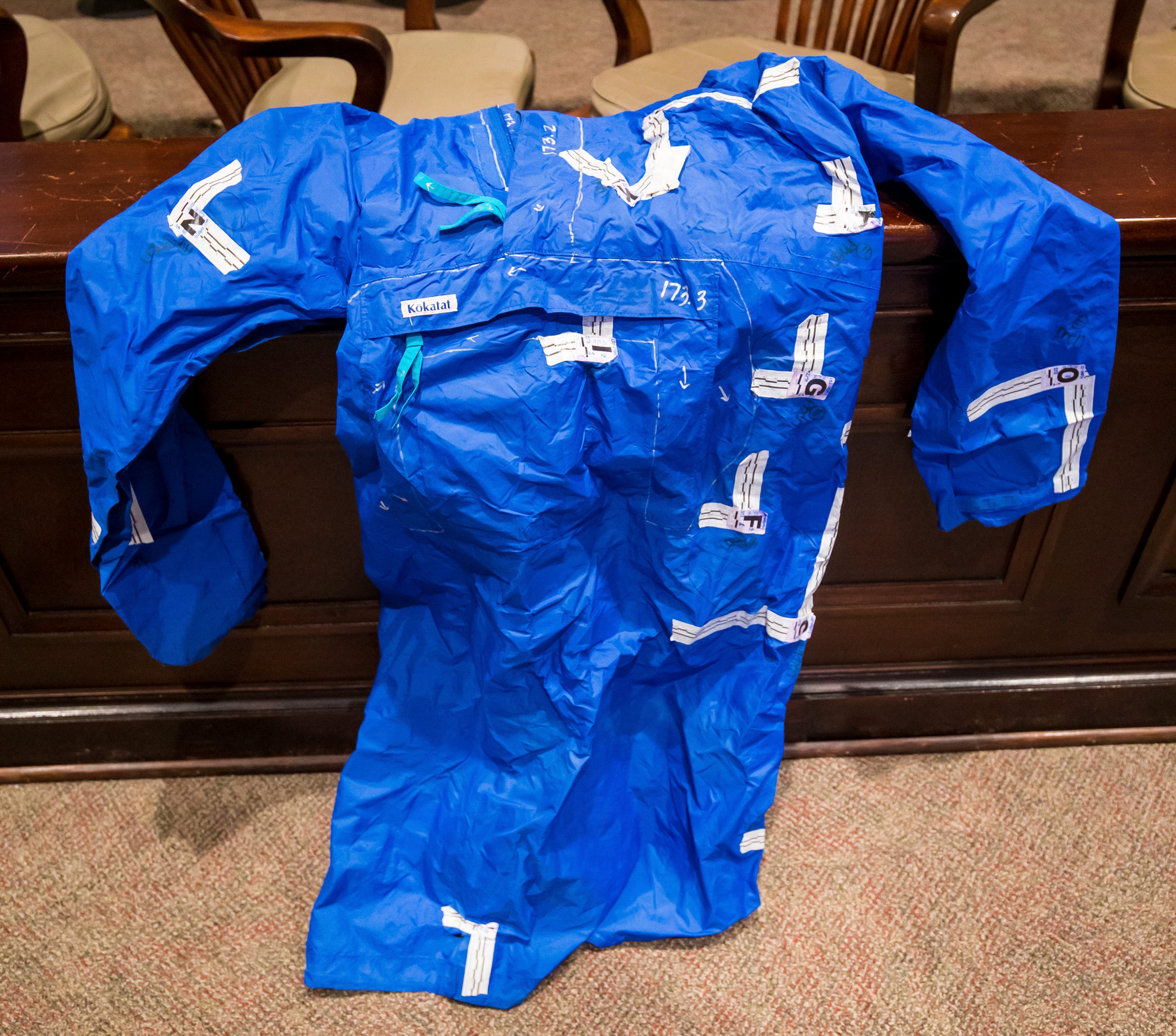 Blue raincoat shown in court