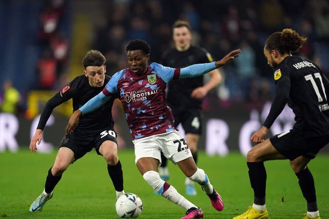 Ipswich Towns’ Cameron Humphreys (left) and Burnley’s Nathan Tella battle for the ball during the FA Cup fourth round replay at Turf Moor, Burnley. Picture date: Tuesday February 7, 2023.