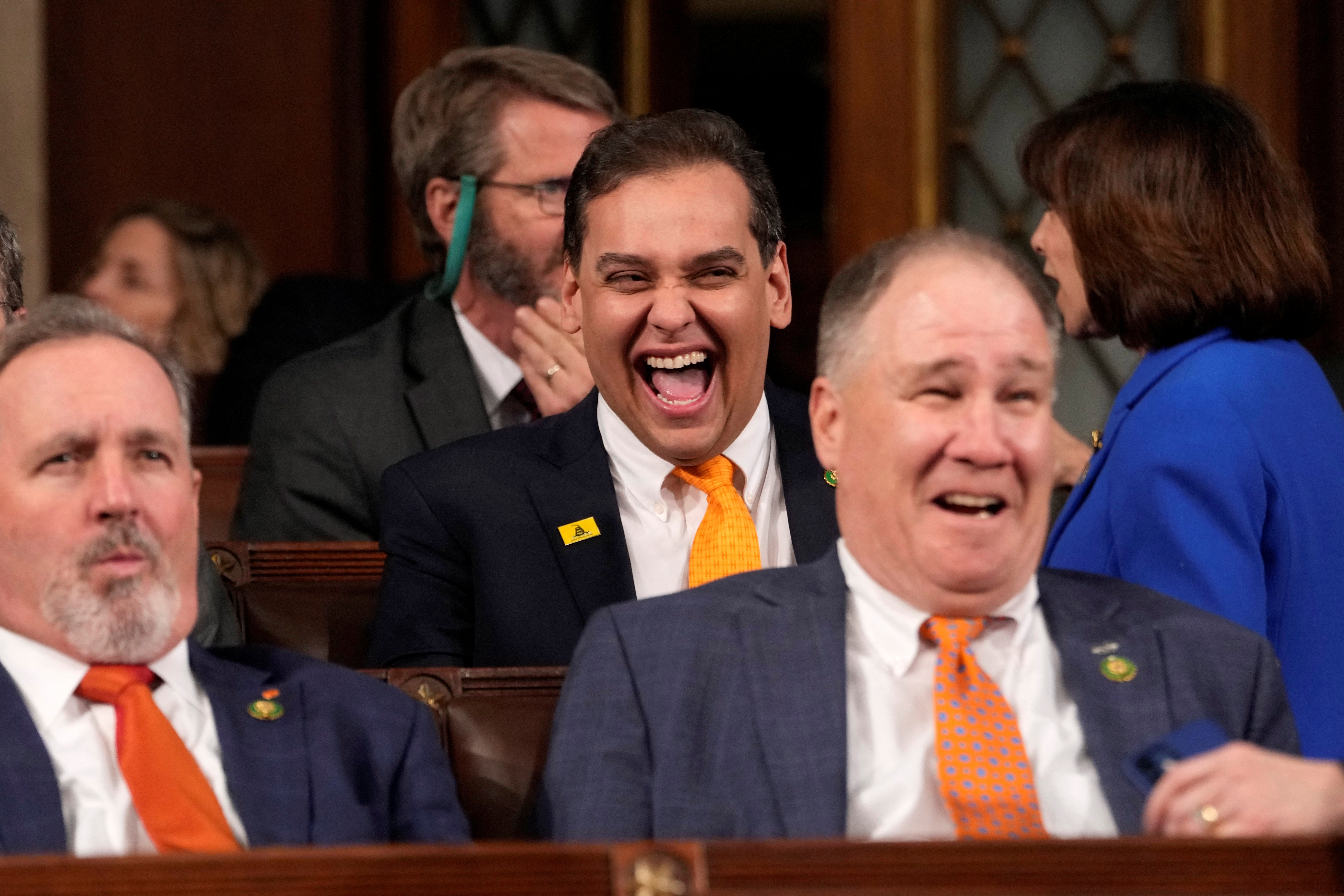 Rep. George Santos laughs before President Joe Biden delivers the State of the Union address