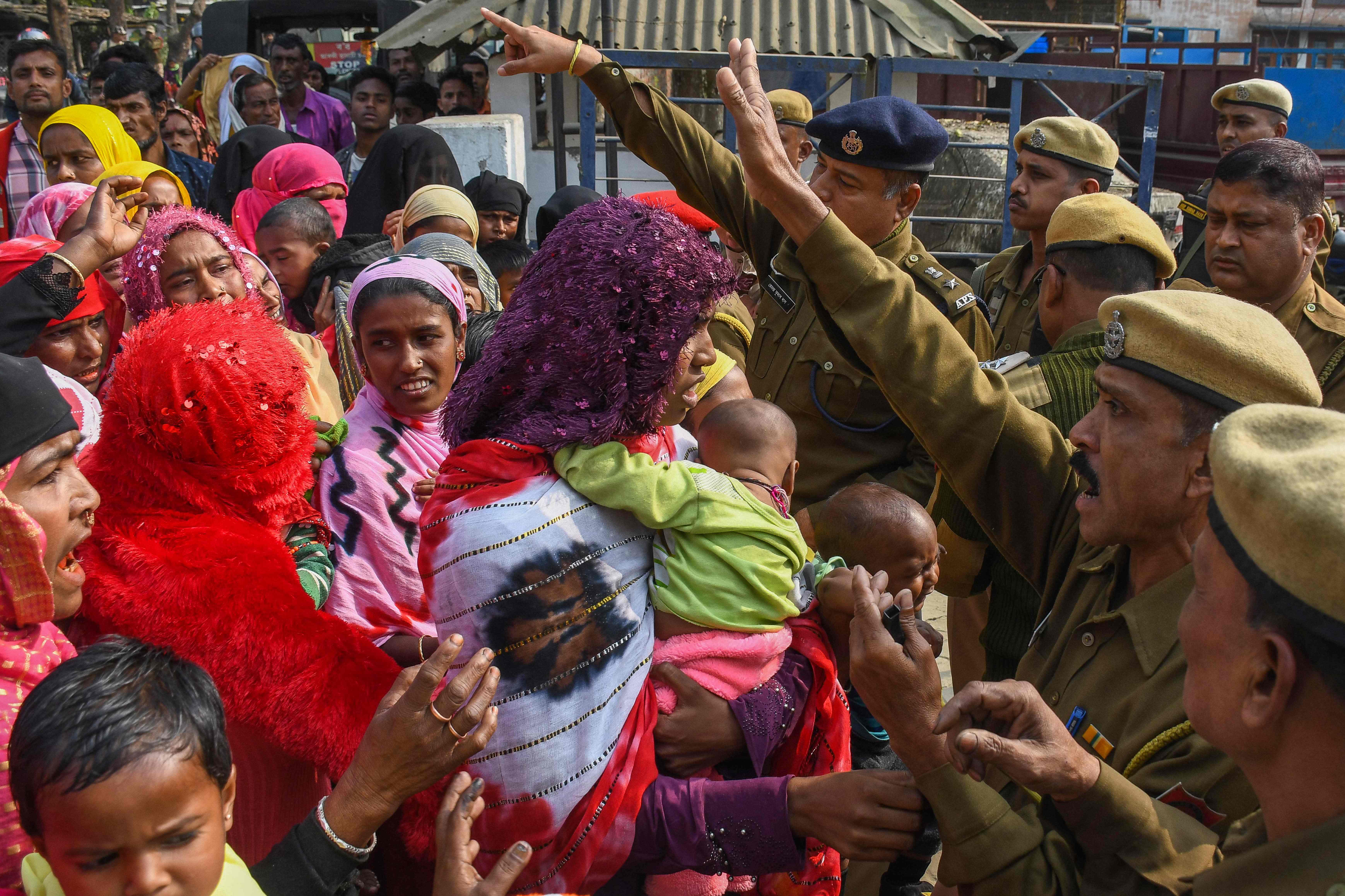 Relatives of people arrested by police for being allegedly involved in child marriages protest against state crackdown