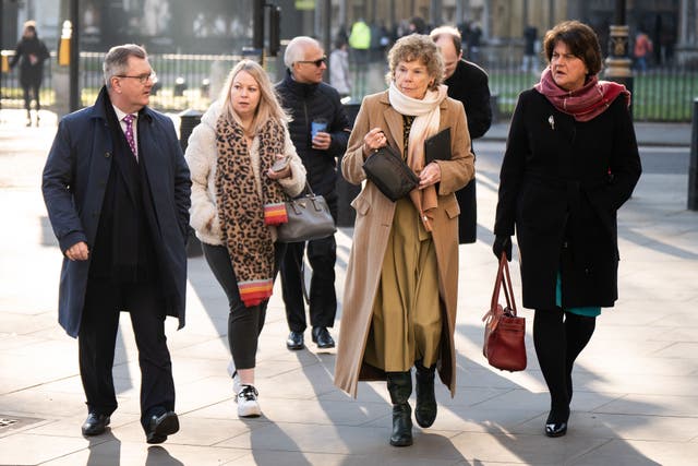 DUP leader Sir Jeffrey Donaldson, Baroness Kate Hoey, and former first minister Dame Arlene Foster outside the UK Supreme Court in London (Aaron Chown/PA)