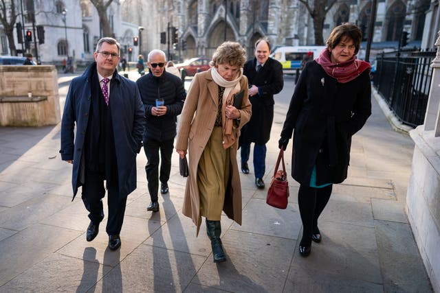 DUP leader Sir Jeffrey Donaldson, Baroness Kate Hoey, and former first minister Dame Arlene Foster outside the UK Supreme Court in London (Aaron Chown/PA)