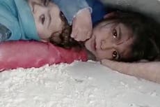 Trapped in quake ruins, girl protects her brother for 36 hours as they wait to be saved
