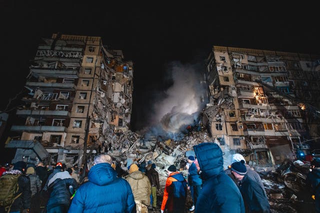 Undated handout photo courtesy of Arsen Dzodzaev, of a block of flats decimated following a Russian air strike on Dnipro in south-eastern Ukraine. Ukrainian photographer Arsen Dzodzaiev, whose photo of a woman in distress as she sits in the rubble of her own flat has gone viral, has vowed to continue documenting the war, saying “the world should know”. Issue date: Wednesday January 18, 2023.
