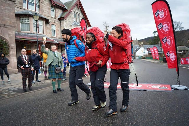 Emma Willis, Oti Mabuse and Rylan are seen taking part in the Red Nose Day challenge in the Scottish Highlands (Hamish Frost/Comic Relief/PA)