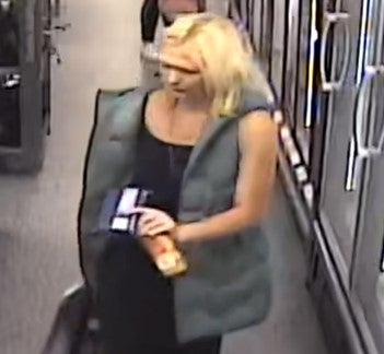 CCTV of Ms Jarvis shopping in the months before she disappeared - she was last seen wearing a similar distinctive sleeveless coat