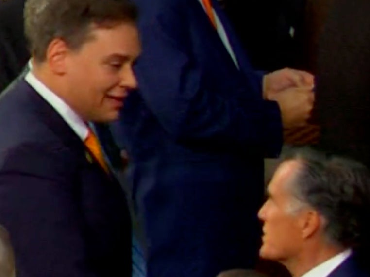 George Santos and Mitt Romney has a tense exchange ahead of the State of the Union