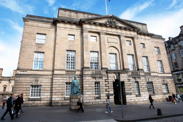 The trial is taking place at the High Court in Edinburgh (PA)