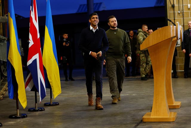 Prime Minister Rishi Sunak (left) and Ukrainian President Volodymyr Zelensky arrive for a press conference at an army camp, in Lulworth, Dorset UPeter Nicholls/PA)