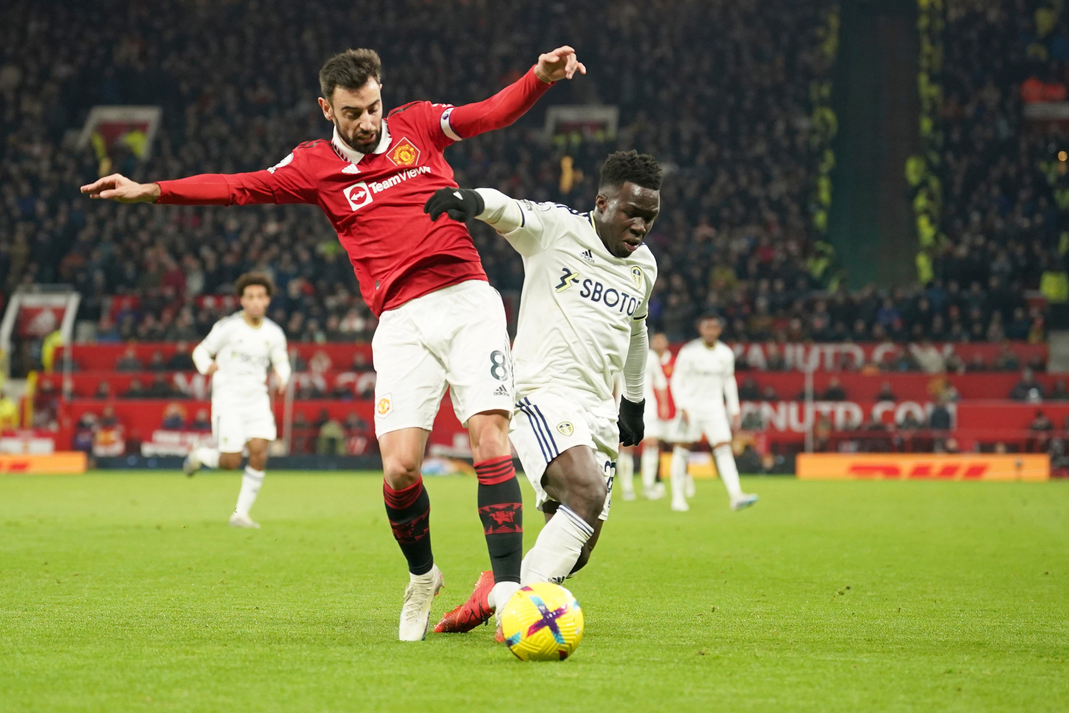 Bruno Fernandes battles with Willy Gnonto for the ball