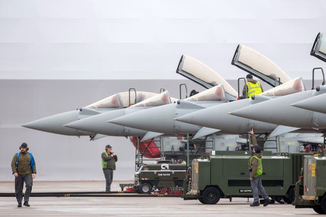 Typhoons return to base at RAF Coningsby in Lincolnshire (Joe Giddens/PA)