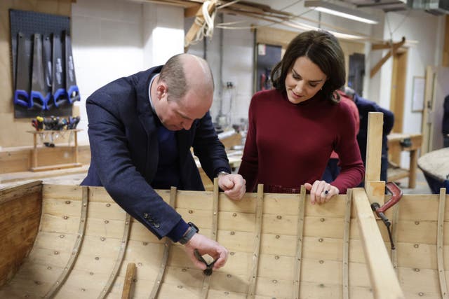 The Prince and Princess of Wales tried their hand at boat restoring (Chris Jackson/PA)