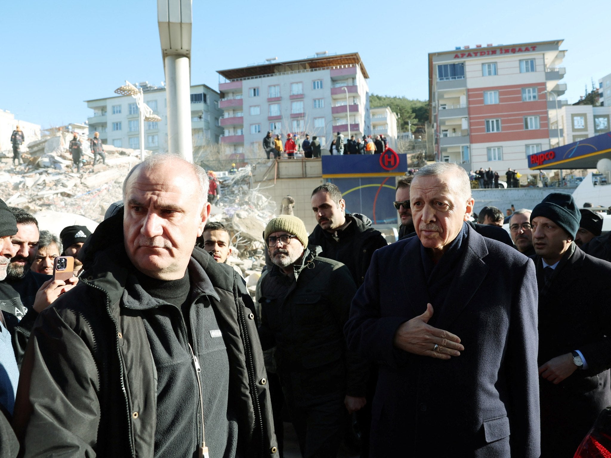 Turkish President Tayyip Erdogan meets with people in the aftermath of a deadly earthquake in Kahramanmaras