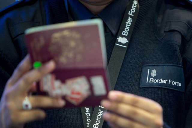 Travellers are being warned of delays returning to the UK next week because of a strike by Border Force staff (PA)