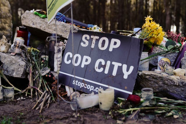 <p>A ‘Stop Cop City’  banner at a makeshift memorial in Atlanta </p>
