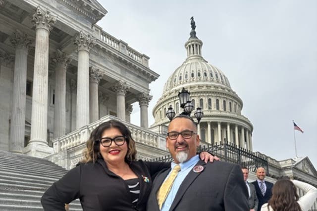 <p>Richard Fierro, of Colorado Springs, poses with his wife in Washington DC, where he was attending the State of the Union after subduing the gunman during November’s Club Q attack in his hometown</p>