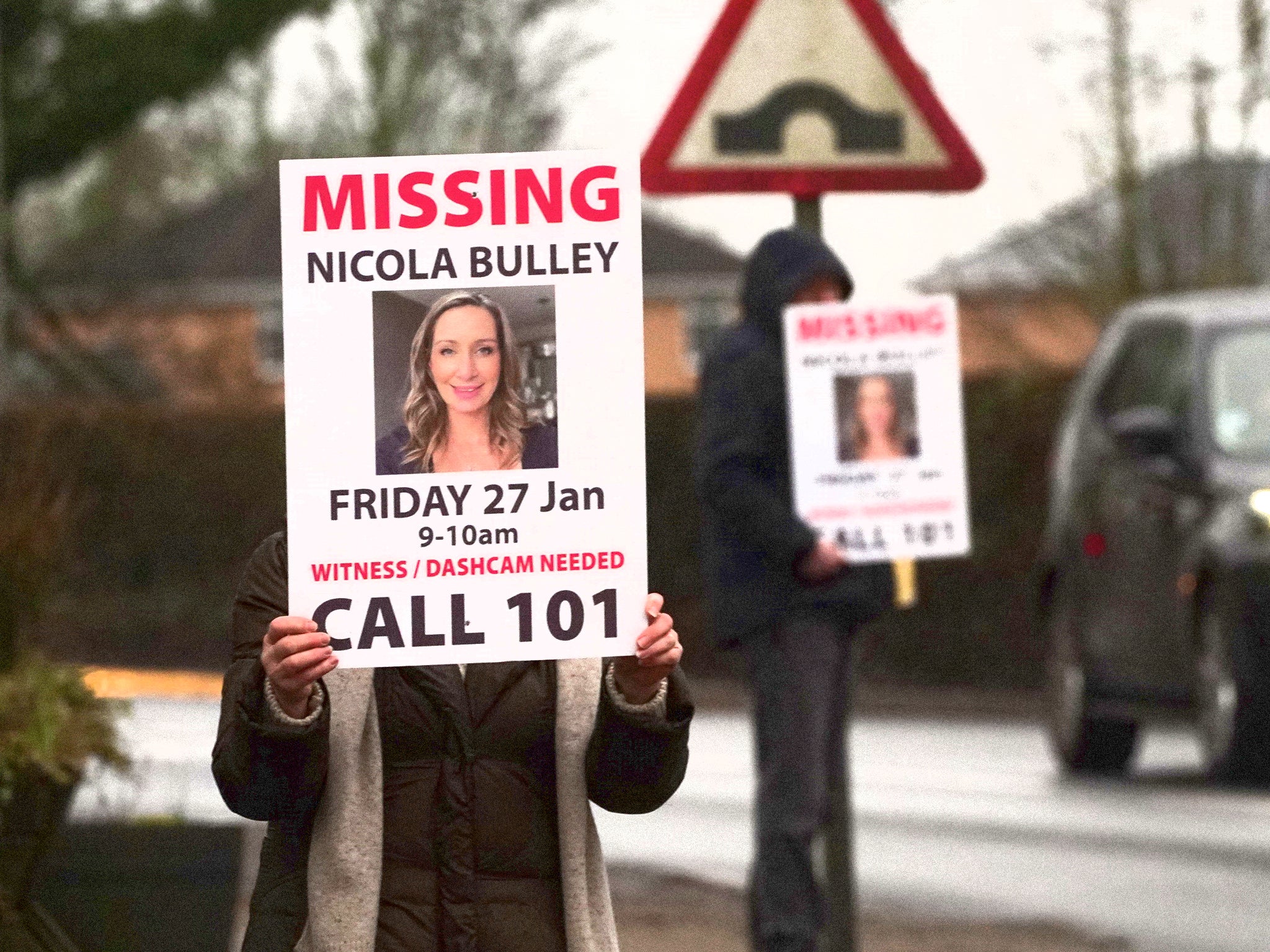 Missing person posters depicting Nicola Bulley are held along a roadside in St Michael’s on Wyre, Lancashire
