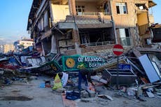 Sniffer dog searches for earthquake survivors in Turkey as death toll passes 21,000