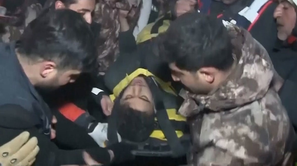 Moment teenager pulled from earthquake rubble after being trapped for 94 hours