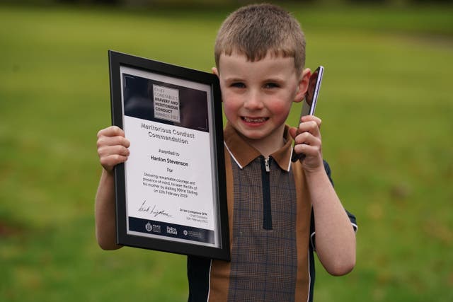 Hanlon Stevenson received a Chief Constable’s Bravery and Excellence Award at the Police Scotland headquarters in Tulliallan (Andrew Milligan/PA)