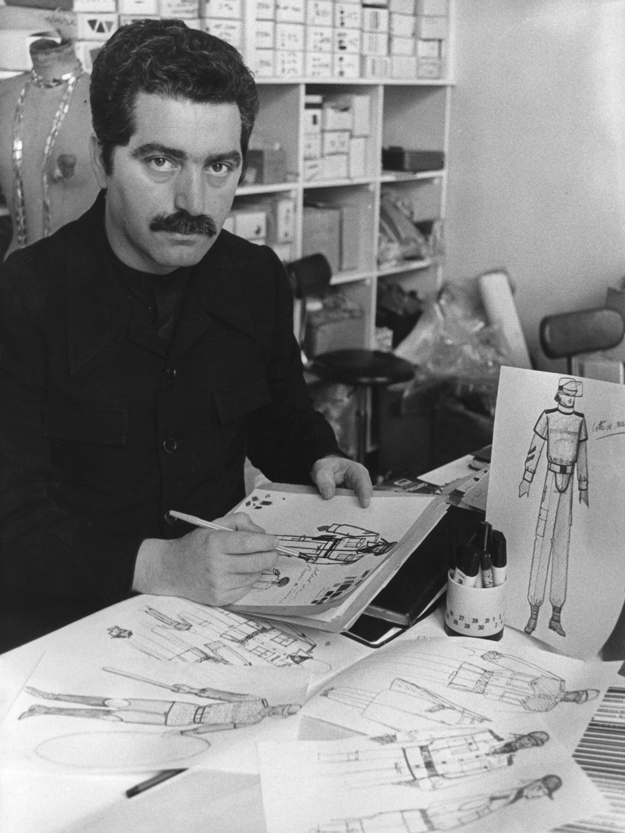Designing uniforms for the French army in his Paris studio