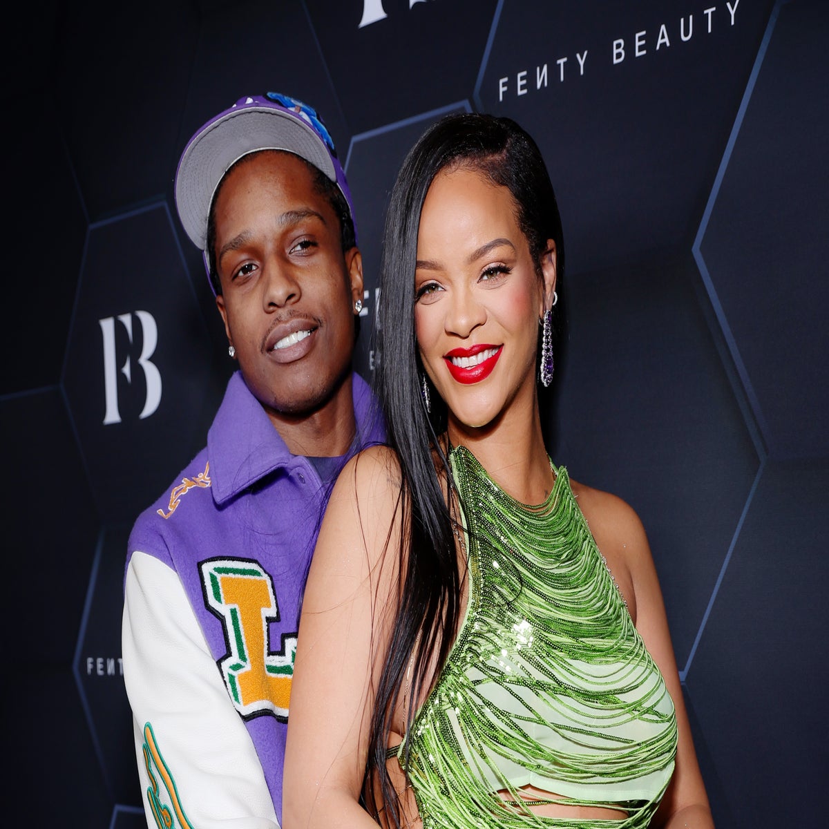 Rihanna and A$AP Rocky pose for family photos with new baby