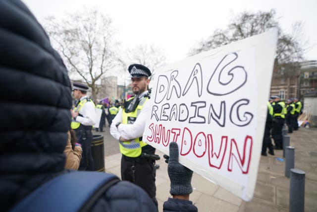A protester outside the Tate Britain, which was hosting Drag Queen Story Hour UK (James Manning/PA)