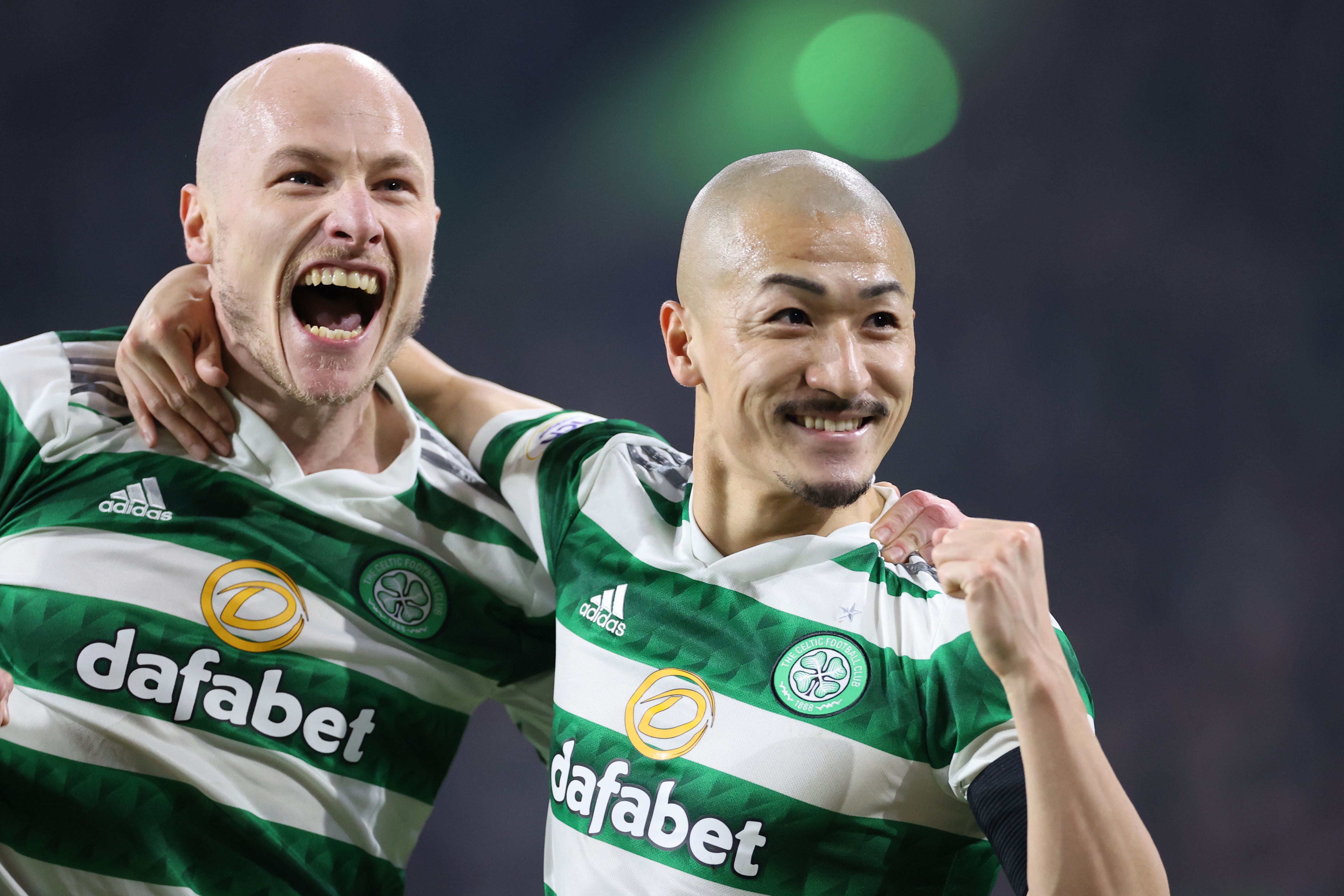 Celtic’s Daizen Maeda (right) celebrates with Aaron Mooy after opening the scoring against St Mirren (Steve Welsh/PA)
