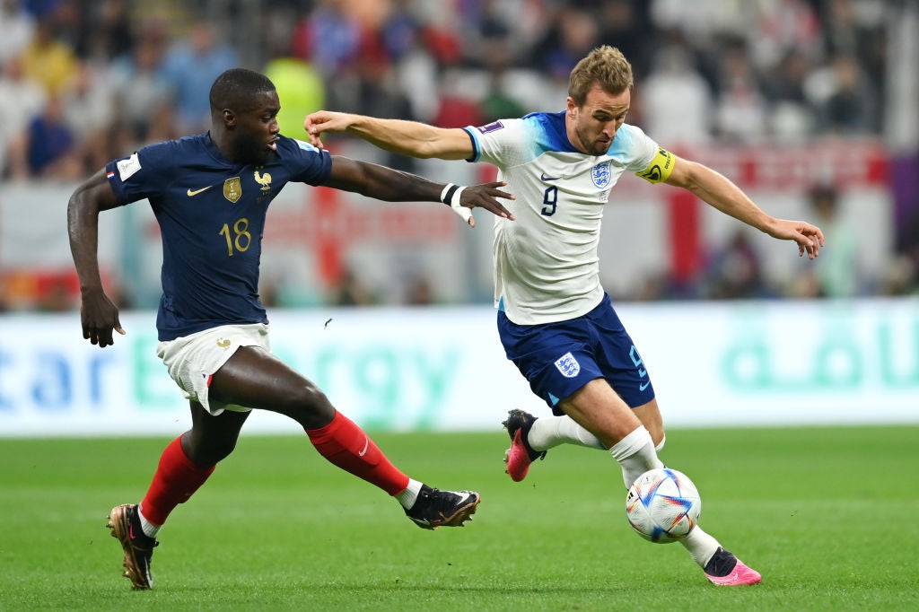 Award ceremony: UPAMECANO Dayot (FRA) walks past the trophy, cup, trophy,  disappointment, frustrated, disappointed, frustrated, rejected, left:  GUENDOUZI Matteo (FRA). Game 64, FINAL Argentina - France 4-2 nE (3-3) on  December 18th