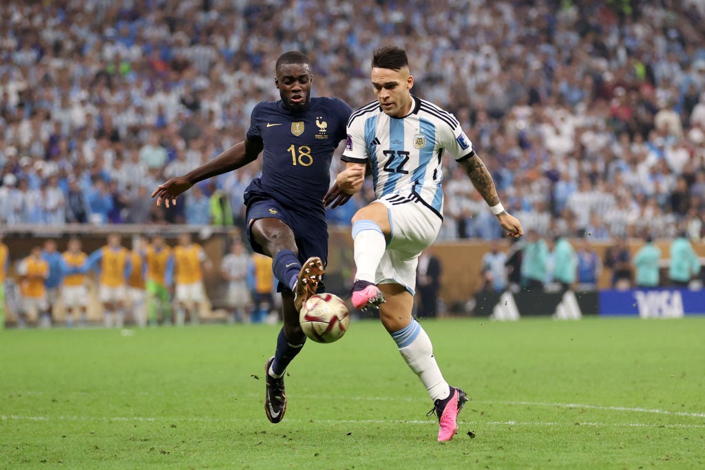 Dayot Upamecano challenges Argentina’s Lautaro Martinez in the World Cup final