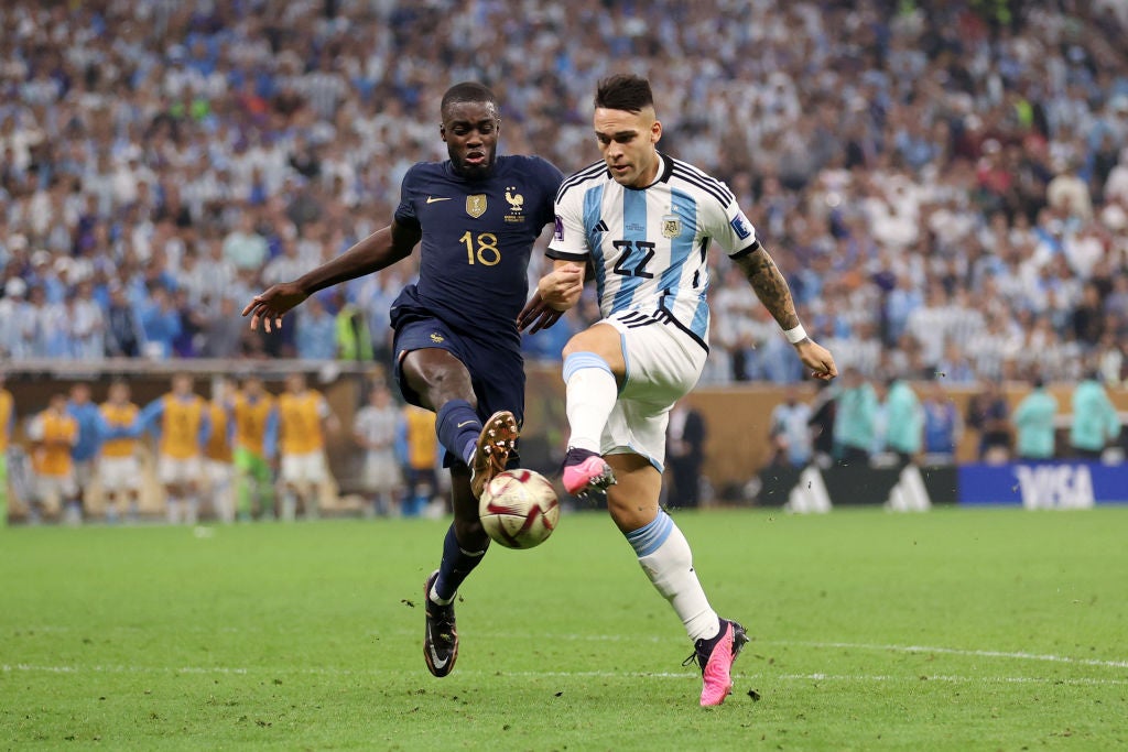 Award ceremony: UPAMECANO Dayot (FRA) walks past the trophy, cup, trophy,  disappointment, frustrated, disappointed, frustrated, rejected, left:  GUENDOUZI Matteo (FRA). Game 64, FINAL Argentina - France 4-2 nE (3-3) on  December 18th