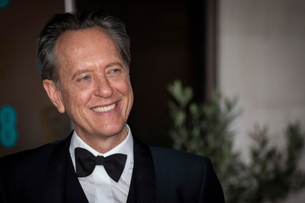 Richard E Grant makes slap joke in Baftas opening speech