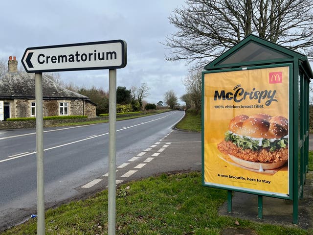 <p>Burger giant’s McCrispy advert was installed next to Penmount Crematorium</p>