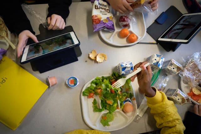 <p>File photo: Seventh graders sit together in the cafeteria during their lunch break at a public school, Saturday, 11 February 2023, in Brooklyn </p>