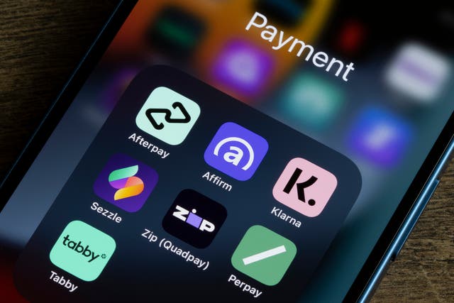 <p>Assorted payment apps offering Buy Now Pay Later services are seen on an iPhone, including Afterpay, Affirm, Klarna, Sezzle, Zip (Quadpay), Perpay, and Tabby</p>