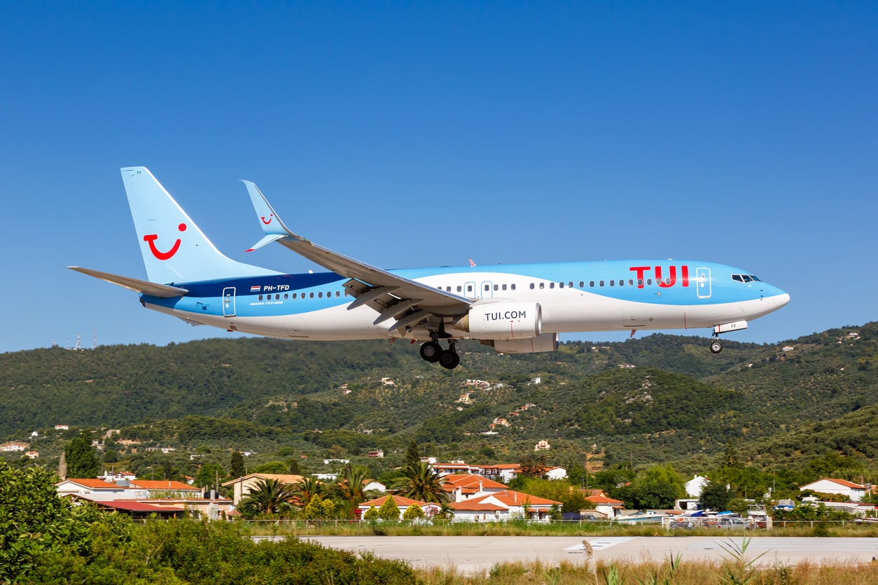 A Tui plane lands in Skiathos, Greece