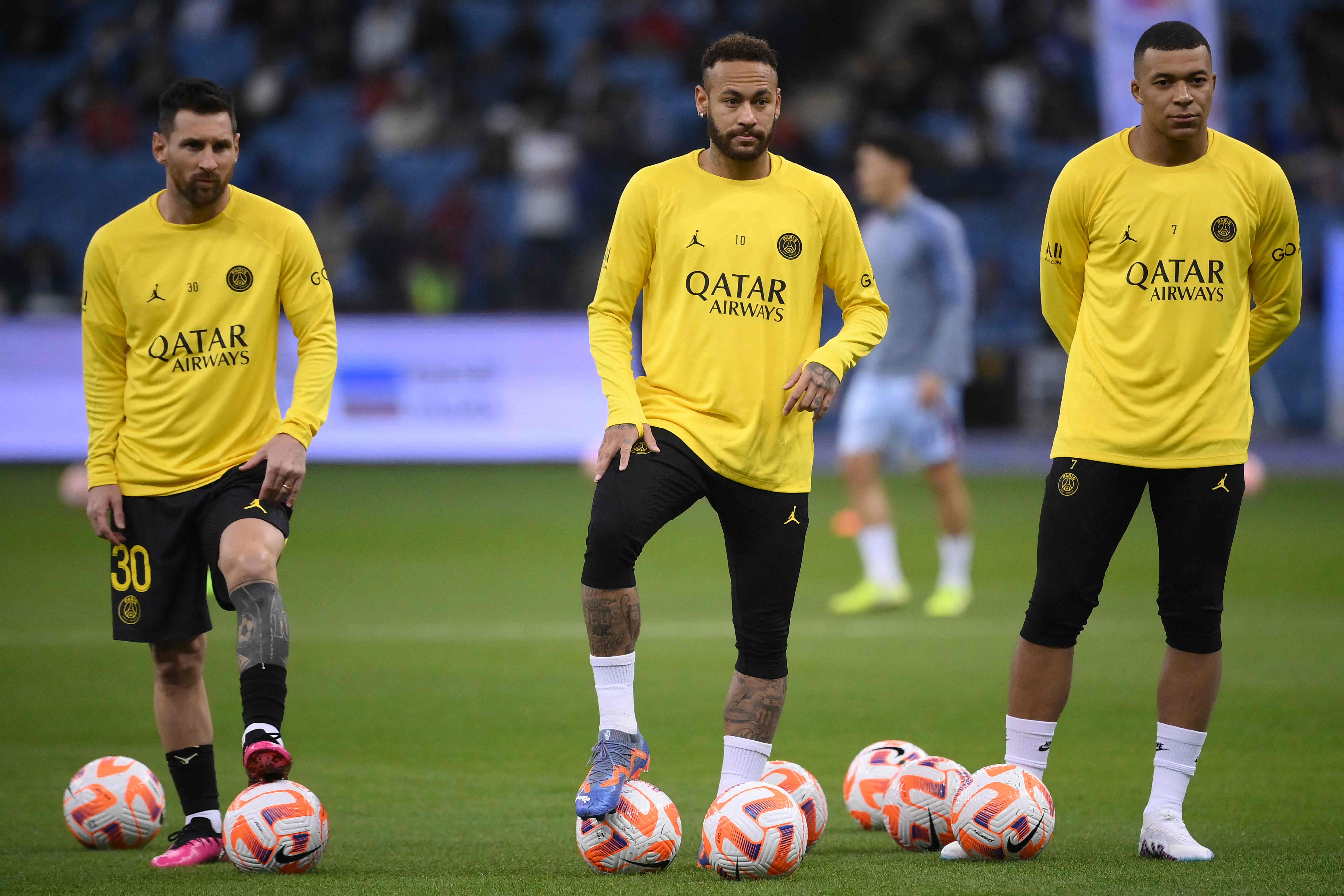 <p>Lionel Messi, Neymar and Kylian Mbappe warm up for PSG</p>