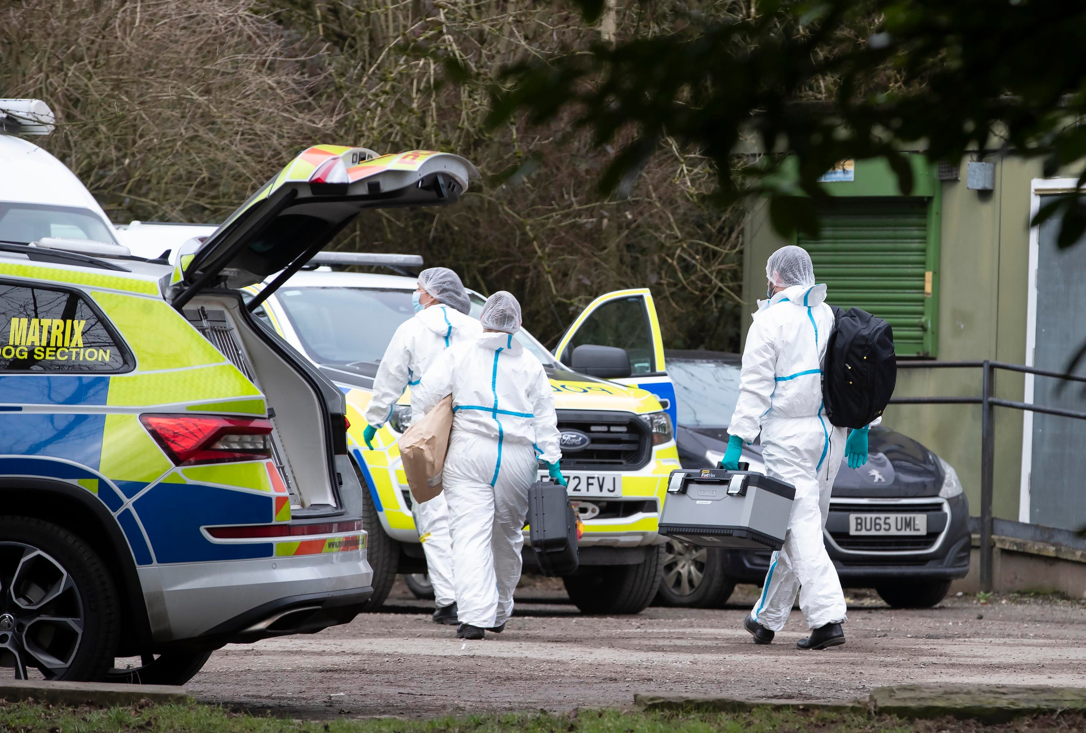 Police forensics officers at the scene in Culcheth Linear Park in Warrington, Cheshire, following the murder of Brianna Ghey