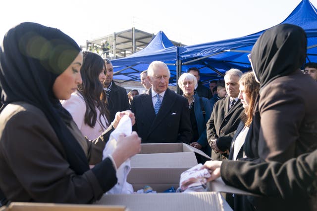 The King meets members of the Turkish community who have been collecting, packaging and organising the transportation of food, blankets and warm clothing for those affected by the quake (Kirsty O’Connor/PA)