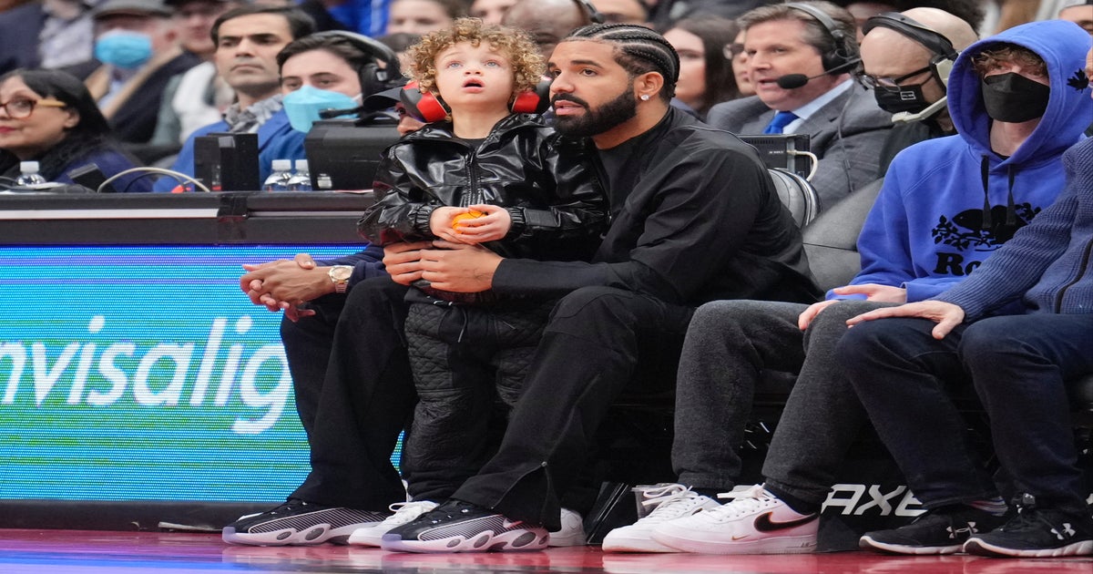 Drake and Son Adonis Attend Raptors Game, Outfit Details