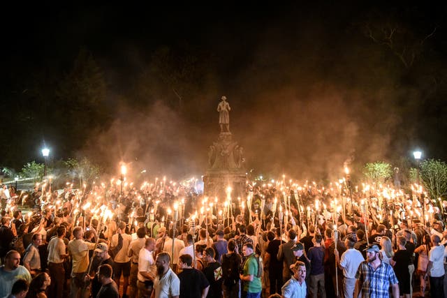 <p>White nationalists participate in a torch-lit march on the grounds of the University of Virginia ahead of the Unite the Right Rally in Charlottesville, Virginia</p>