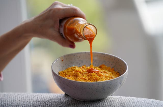 <p>The study revealed many enjoy eating crisps with something sweet, covering them with chili sauce, or dipping them while it’s in their mouth</p>