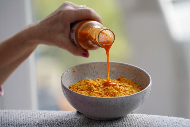 <p>The study revealed many enjoy eating crisps with something sweet, covering them with chili sauce, or dipping them while it’s in their mouth</p>