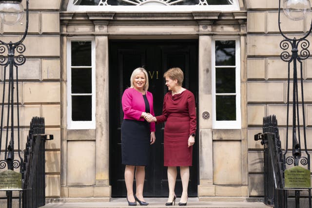 First Minister Nicola Sturgeon welcomes Sinn Fein vice president Michelle O’Neill (PA)