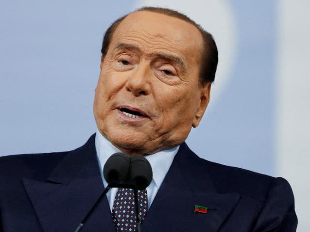 <p>FILE PHOTO: Forza Italia leader Silvio Berlusconi speaks during the closing electoral campaign rally </p>