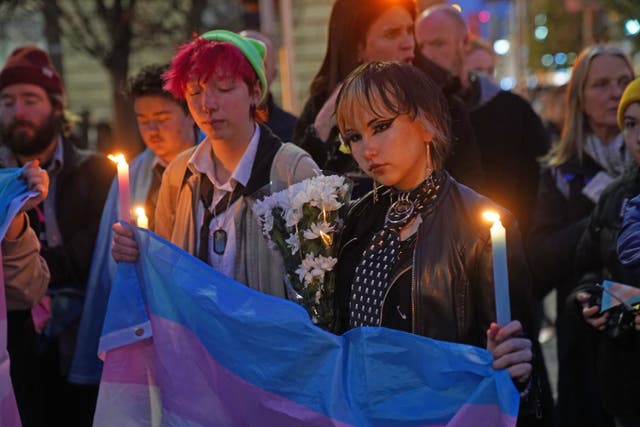 Members of the public attend a candle-lit vigil at the Spire on O’Connell Street in Dublin, in memory of transgender teenager Brianna Ghey, who was fatally stabbed in a park on Saturday (Brian Lawless/PA)